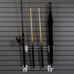 Cue and fishing hook holder on slatwall