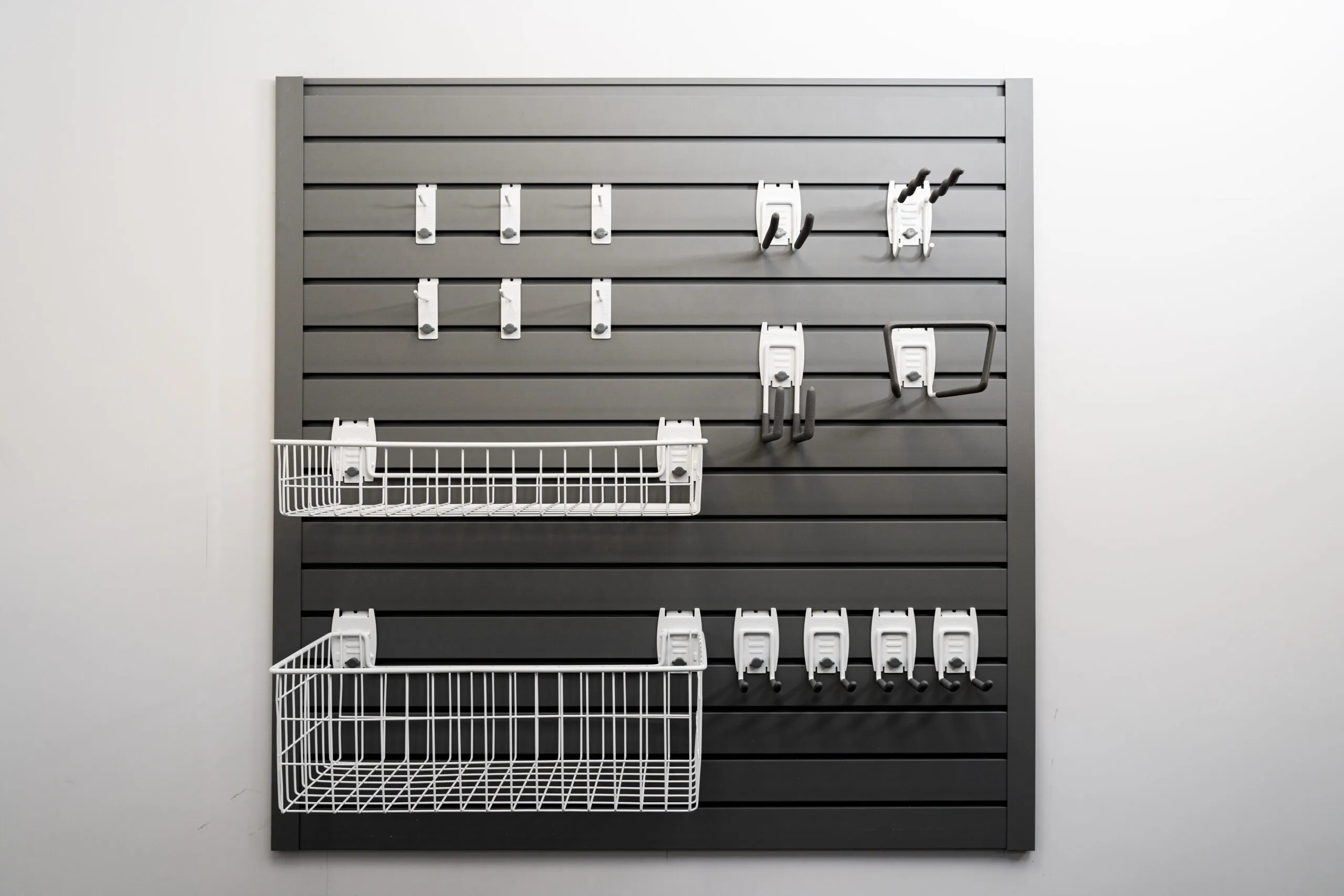 flexipanel garage storage starter set with hook and basket attachements