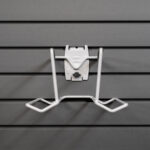 tennis racket holder on slatwall