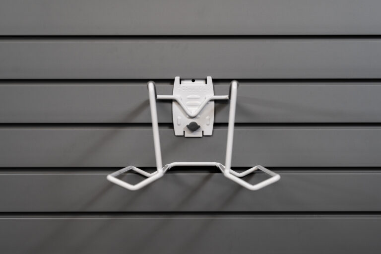 tennis racket holder on slatwall