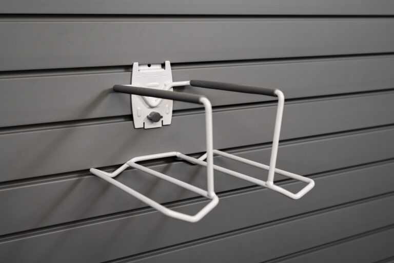 tennis racket holder attached to flexipanel slatwall