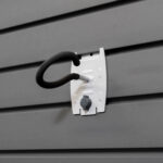 fishing pole holder on slatwall